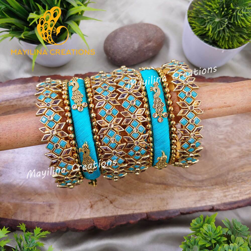 Aavani_-  Teal Bridal_Silk_Thread_Bangles_with_Peacock_Charms