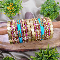 Chitra - Blue and Dark Pink Vibrant Silk Thread Bangles with Peacock Charms for Brides