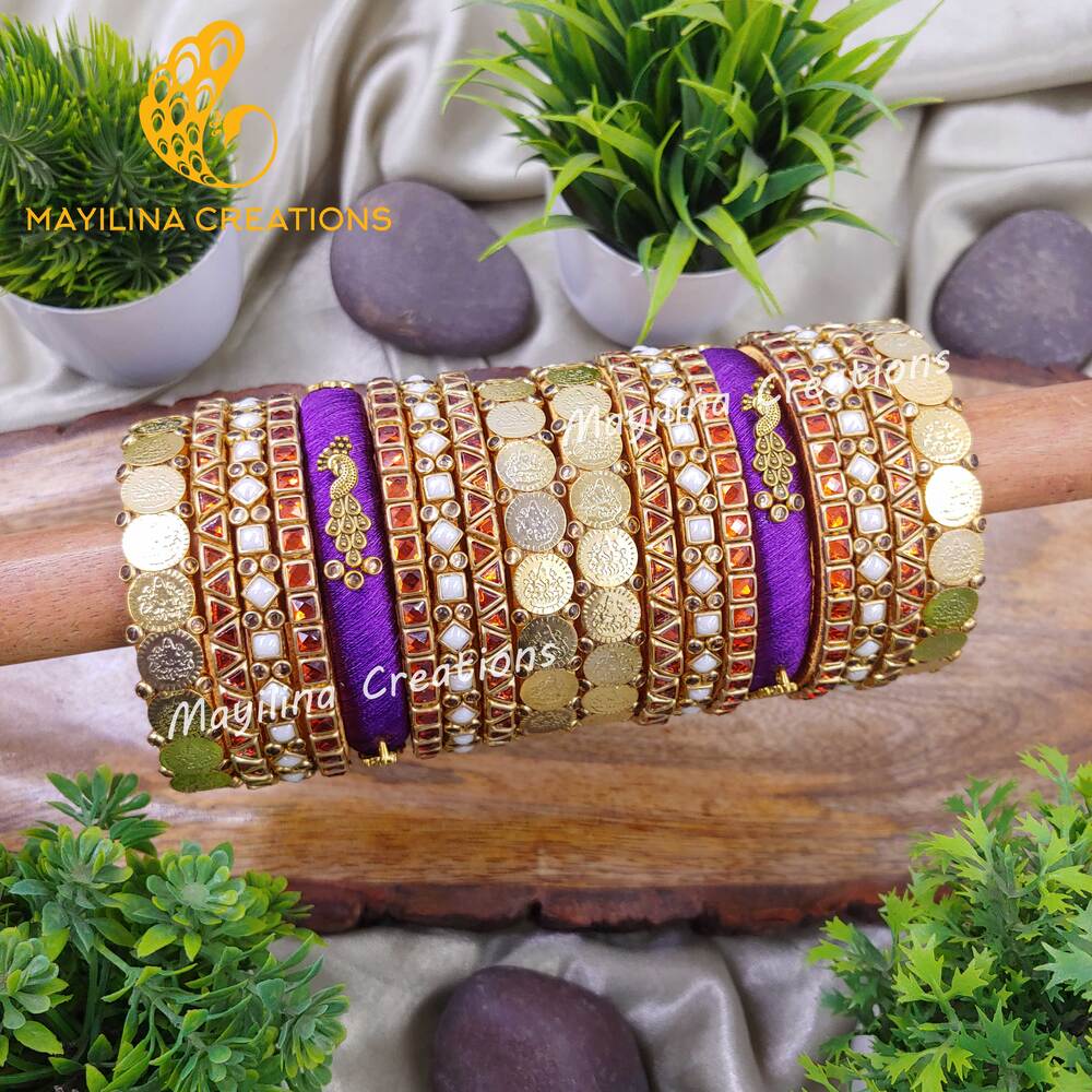 Chitra - Violet and Orange Vibrant Silk Thread Bangles with Peacock Charms for Brides
