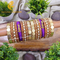 Chitra - Violet and Orange Vibrant Silk Thread Bangles with Peacock Charms for Brides