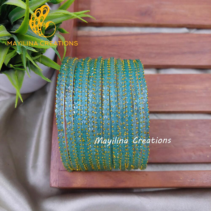 Light Blue Heart Cut Pattern Glass Bangles
