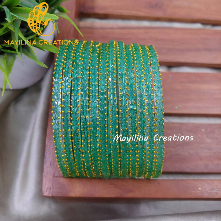 Light Teal Heart Cut Pattern Glass Bangles