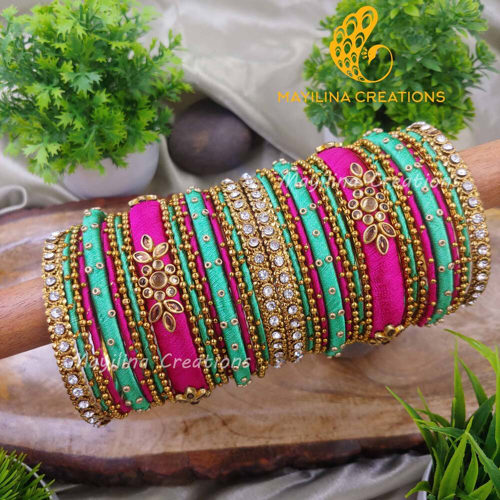 Pink and Green Silk Thread Kundan Bangles with Metal Bangles for Women. (Set of 38 Bangles)