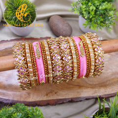 Ovia - Light Pink Bridal Silk Thread Bangles with Peacock Charms