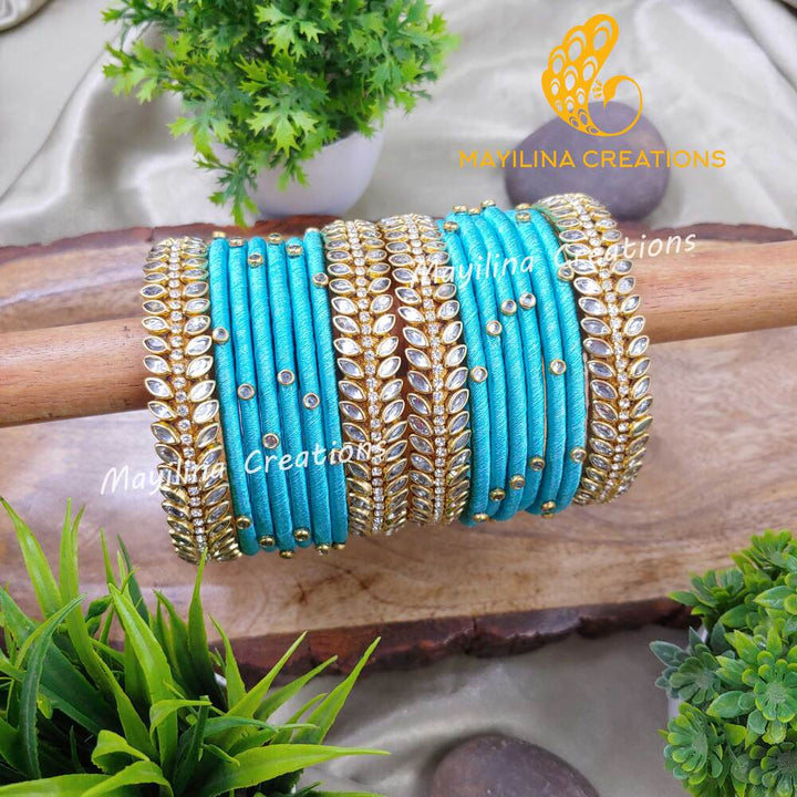 Sravani - Light Blue Silk Thread Bangles with Border Leaf Bangles for Women