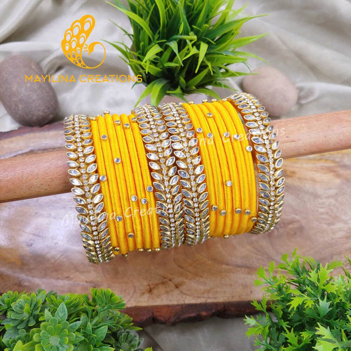 Sravani - Yellow Silk Thread Bangles with Border Leaf Bangles for Women